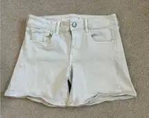 American eagle midi beige denim shorts in size 8