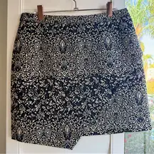 H&M floral brocade mini wrap style skirt in navy blue size 10