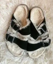 Fuzzy dark green Birkenstocks