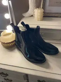 Black glossy rain boots