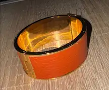 Parker Daniel’s bracket Orange Leather Bangle hinge gold toned