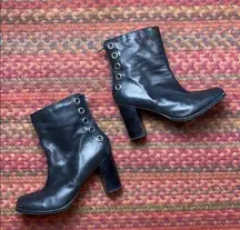 BLACK GROMMET ZIP UP HEELED BOOTIES