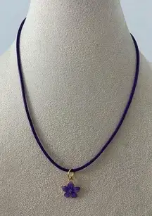 Purple flower pendant necklace