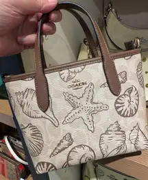 NWT Coach City Mini Tote Bag Signature Canvas With Shell Print CBM65 Gold/Sand