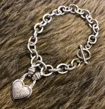 Genuine diamond 1/4 ct. t.w. heart charm bracelet