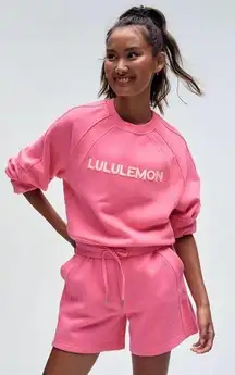 NEW Lululemon Scuba Oversized Wordmark Pullover Sweatshirt Sakure Pink M/L