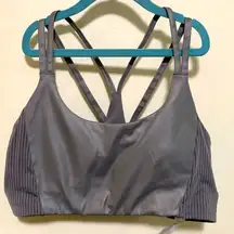 Fabletics metallic gray padded woman sport bra size LARGE criss cross back