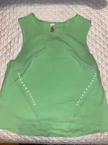 green sleeveless top