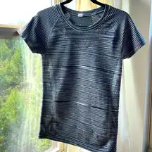 Zelle workout top with netted chest, sides and back. Size med.