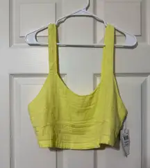 Rip curl cropped top size medium in yellow NWT