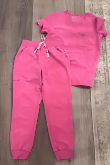 Figs scrubs in F’ing Pink. Top size small, bottoms small petite joggers. Worn once. 