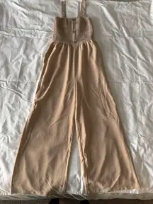 Tan Jumpsuit With Button Detail And Pockets