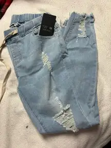 Distressed denim jogger