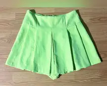 Do+Be light neon yellow/green pleated mini skort. Women’s small