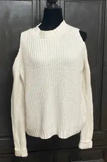 Jennifer Lopez Cream long sleeve cable knit open shoulder sweater- size Large. ***refer to measurement. Gently warn and excellent condition. Measurements approximately 21” from armpit to armpit x 22”. None smoking home. Priced at as is condition. Don’t like my price make a reasonable offer! And thank you for checking my closet!