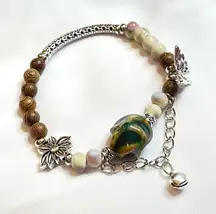 Bell Bracelet green brown lilac ceramic beads lotus silver charm stretchy