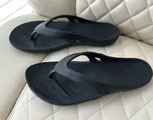 Crocs  black flip flops size 7 women’s