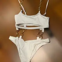 NWT Fashion Nova Small White cut out one piece swimsuit with Gold Chain Accents