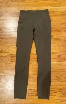 Lulu Lemon Wunder Train HR Tight with Pockets Size 4 in Green