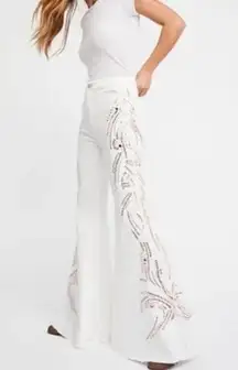 NWT Free People float on crystal embellished flare jeans