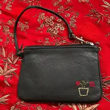 Fossil | leather wristlet with zip closure. Simple, compact and stylish.