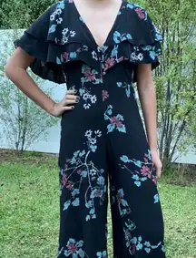 Cleobella Black Floral Ruffle Sleeve Wide Leg Party Jumpsuit Size XS Vacation
