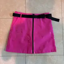 Pink vinyl midi skirt black buckle belt. Size medium. Has black zipper closure