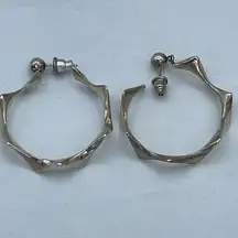 Silver plated dangle hoops with zig zag shaped