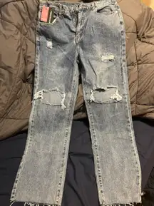 Mid Wash High Rise Ripped Straight Leg Jeans