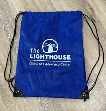 The lighthouse child advocacy center pull string backpack. Support the kids