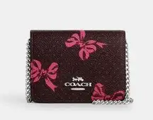 🩷Coach Mini Wallet On a Chain - CZ019 Merlot Coated Canvas w/Pink Bow Print NWT