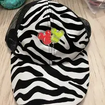 Disney ’s Animal Kingdom Zebra print Hat Mickey balloons