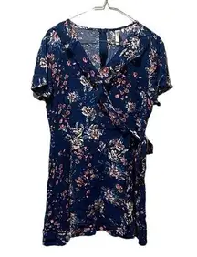 Xhilaration  asymmetrical floral sundress, midi that has a button on the chest​