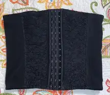 Medium waist trimmer shaper corset black hook and eye lace accents around hooks