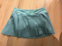 Play Off The Pleats Skirt