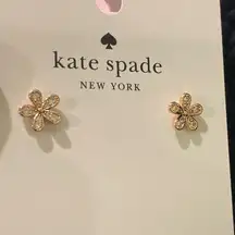 Kate Spade, new with tags and dust bag, clear cubic zirconia and rose gold color