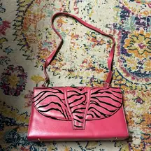 Beautiful pink & black faux leather textured zebra print structured bag.