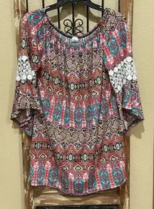 WinWin tunic with pinwheel sleeve