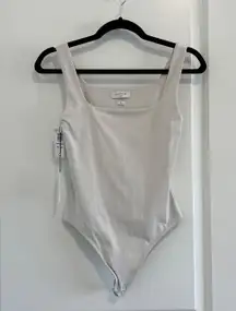 New With Tag  Contour Cream Matte Pearl Bodysuit