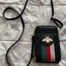 NWOT black gold bee crossbody bag with white, red, green stripes, size 7”x5”