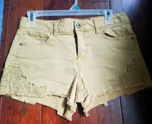 Yellow jean shorts size 9 by vanilla star with details on side