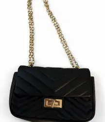 Black small faux leather crossbody bag. Forever 21.