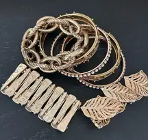 Stack of Gold Tone Architectural Jewelry Bracelets