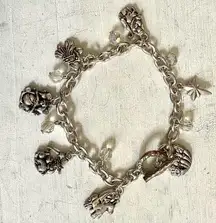 Silver tone religious charm bracelet