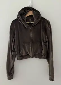 SKIMS Velour cropped Zip-Up Hoodie in a brown/oxide color