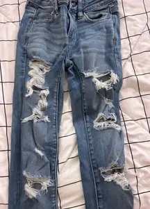 blue ripped jeans next level stretch