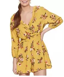 LILY ROSE-YELLOW FLORAL ROMPER-SIZE SMALL Gorgeous yellow romper, floral print, long sleeves, one button back, elastic waist, 100% rayon, excellent condition  Measurements: Bust: armpit to armpit 16 inches  Waist: side to side 13-18 inches  Length: shoulder seam to bottom 29 inches