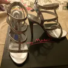 Silver high heels .PERFECT FOR THE HOLIDAYS