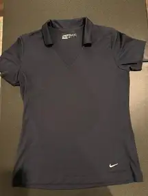 Woman’s navy golf polo