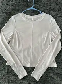 M EUC white long sleeved athletic shirt.